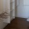 a room with white walls and a wood floor