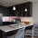 Luxury kitchen with breakfast bar and chairs at The Alexander high rise apartments in Philadelphia