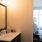 a bathroom with a large mirror